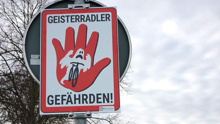 Schild mit einer roten Hand